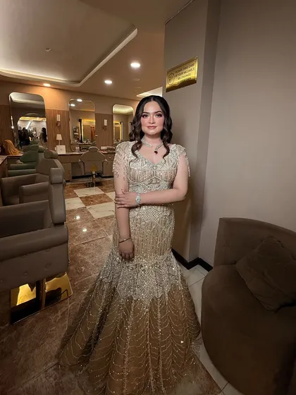 A full-length shot of the bride in her beautiful mermaid-style gown.