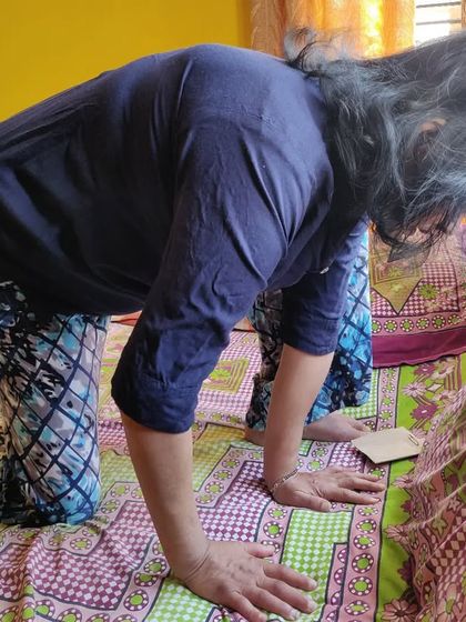 A key part of stroke rehab is functional re-education. Here, we are working on core stability and weight-bearing exercises on the bed to improve balance and prepare for standing and walking.