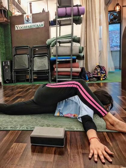 A challenging forward split variation from our advanced yogasana batch.