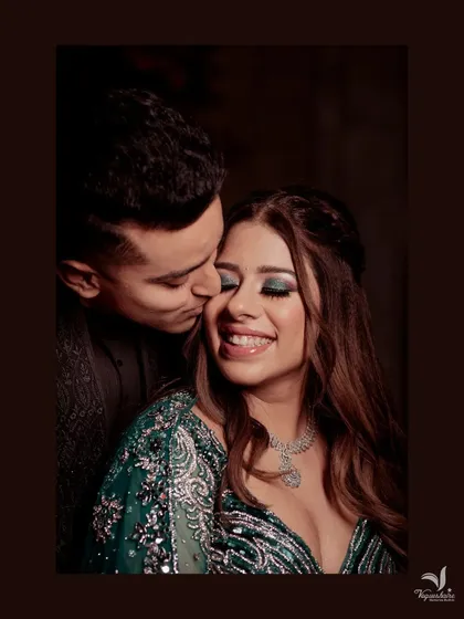 A beautiful, happy portrait of the couple after their engagement. The bride's smile is absolutely radiant.