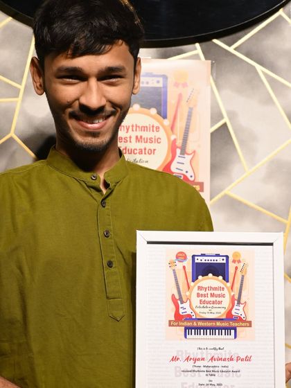 Mr. Aryan Avinash Patil, a young and talented musician, receiving the "Rhythmite Best Music Educator" award for Tabla. We encourage and celebrate educators of all ages.