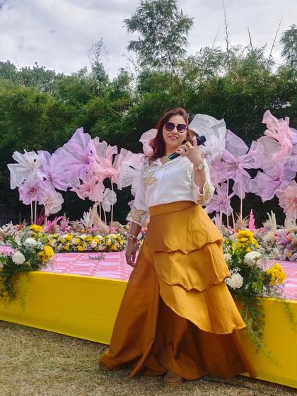 A bold and sunny look for a Haldi function. The yellow skirt and confident attitude are a perfect match for a bright day of celebration.