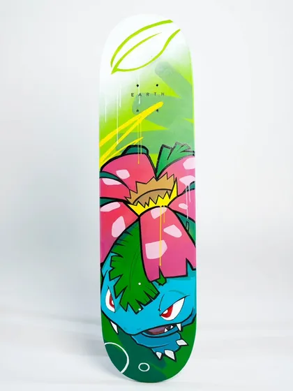 Here's the Venusaur deck, representing the Earth element. The design is full of rich greens and pinks to match the character's plant-based look.
