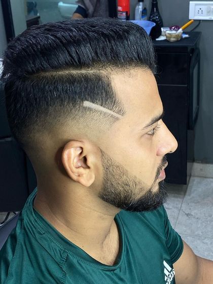 A simple yet effective design. A single, clean line cut into a high fade adds a sharp detail to the overall look.