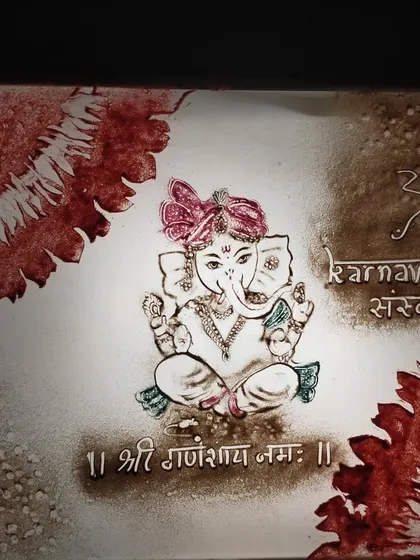 A beautiful invitation card for a Karnavedhan Sanskar ceremony, featuring a colorful drawing of Lord Ganesha. We can design art for all types of traditional ceremonies and events.