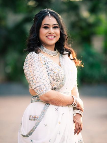 A happy and radiant engagement bride. I created a soft smokey eye to add a touch of glam to her look, while keeping the rest of the makeup fresh and natural to let her smile shine.