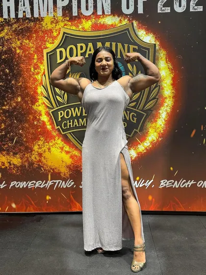 On stage at the Dopamine Powerlifting Championship, this moment captures the vision and confidence that comes from achieving your goals. My journey has given me a platform to inspire others, and I bring that same champion mindset to our coaching partnership.