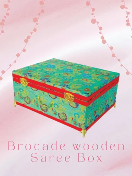 A slightly smaller version of my trousseau trunk, this brocade wooden saree box is ideal for gifting or storing special occasion wear. The vibrant floral pattern adds a touch of festive charm.
