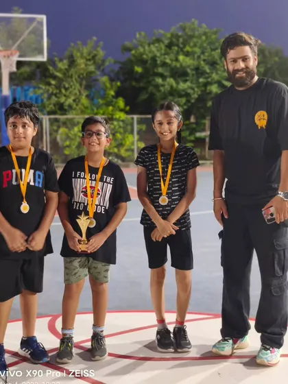The team stands proudly with their medals and trophy after the U-10 FireBall tournament. This is a memory they will cherish and build upon.