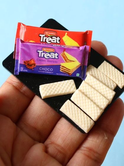 A miniature packet of Treat wafer biscuits, a nostalgic snack for many.