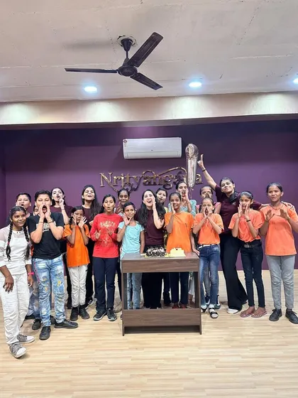 Our team and the wonderful kids from the Dream Girl Foundation NGO posing for a group photo during our 7th-anniversary celebration.