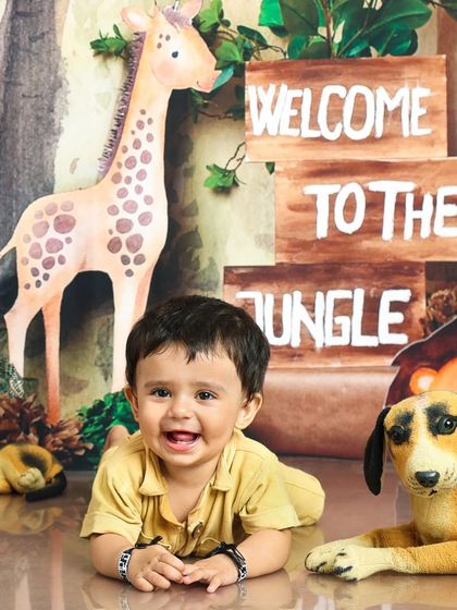 A happy jungle explorer crawling through the wilderness. This theme is perfect for adventurous little ones.