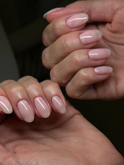 A classic, sheer pink nude manicure. This look is timeless, versatile, and always looks polished and sophisticated.