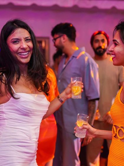 Friends enjoying the music and drinks at a private event. This is what a successful party looks like.