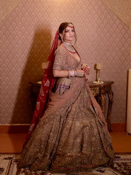 Alluring eyes, dazzling lips, and a spellbinding essence. This look is all about modern bridal beauty for a reception or cocktail event.