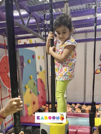 Carefully navigating the obstacle course. Our staff is always nearby to offer a helping hand.