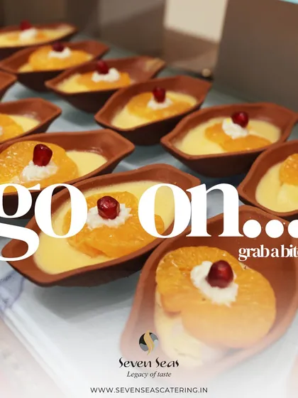 Go on, grab a bite! These individual dessert cups with fresh orange and pomegranate offer a light and refreshing end to a global culinary journey.