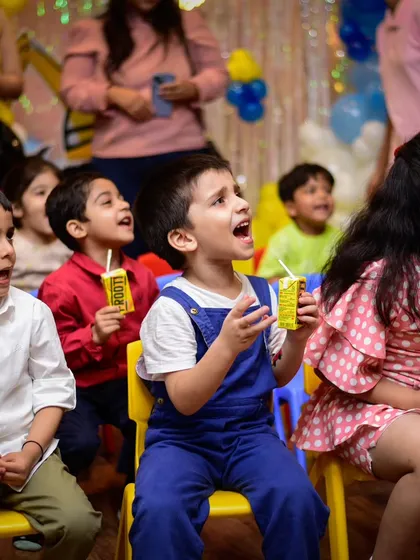 The look of pure amazement on the kids' faces while watching the entertainment.
