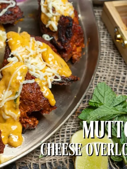 A close-up of the melty cheese and rich mutton in our Mutton Cheese Overload.