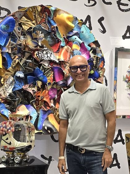 At the Wedding Collective exhibition, standing with my circular butterfly installation in The Designera's booth.