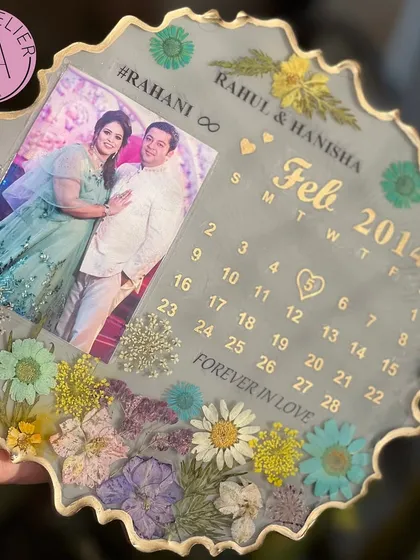 A beautiful anniversary frame in a soft grey, personalized with the couple's names, wedding date, and a lovely quote. The pastel flowers add a delicate and romantic touch.