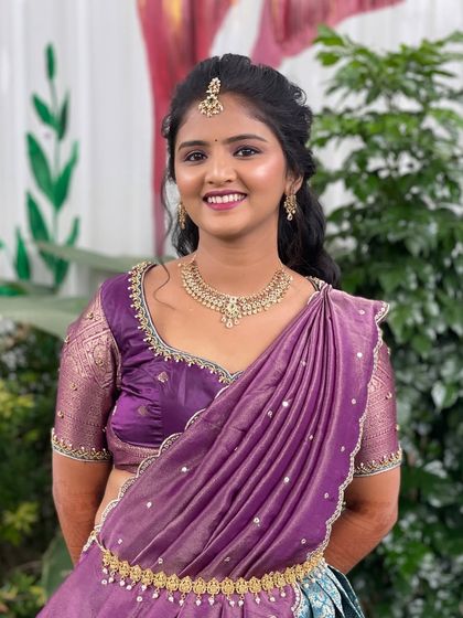 A close up portrait of the bride, showcasing her simple and elegant makeup for the welcome event.