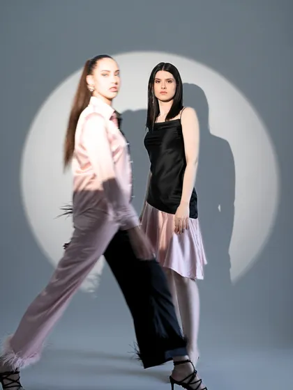 An artistic shot using motion blur to create a sense of movement and energy. This technique adds a dynamic, editorial quality to a studio lookbook.