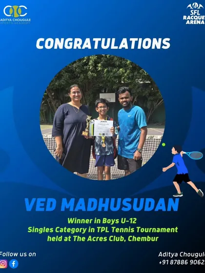 Celebrating Ved Madhusudan, winner in the Boys U-12 Singles category. He stands proudly with his family and coach, showcasing the supportive community at our academy.