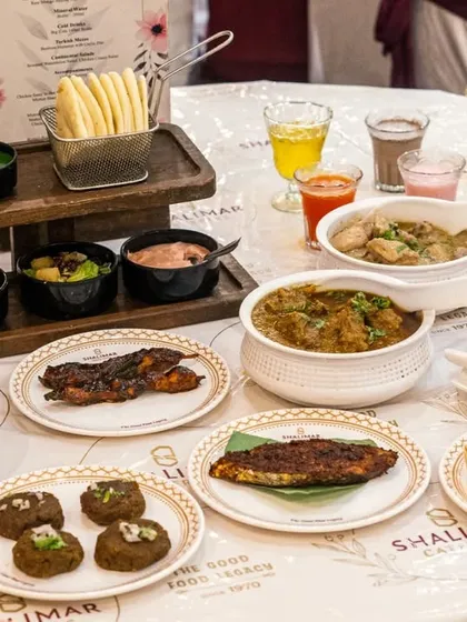 A full table spread showcasing the variety and elegance of our catering. From starters to mains, every dish is plated beautifully on our custom dinnerware.