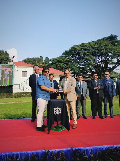 A moment from the Rajyotsava Trophy ceremony.