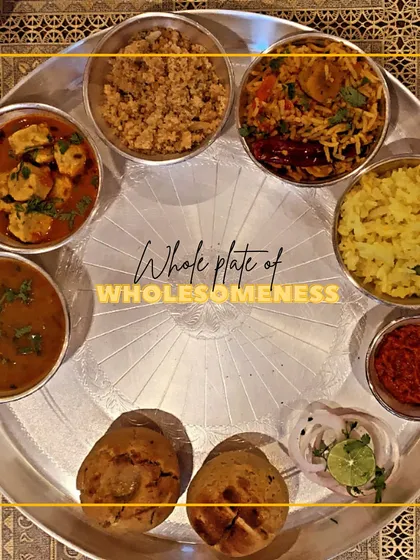 This is what a plate full of love and tradition looks like. Our Rajasthani thali features classics like baked baati, gatte ki sabzi, and churma, offering a complete, wholesome meal that tastes just like home.