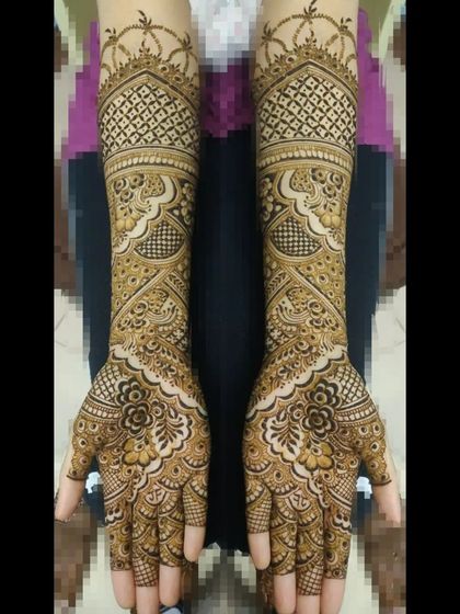 A classic and symmetrical full bridal design, featuring traditional motifs and geometric patterns for a timeless look.