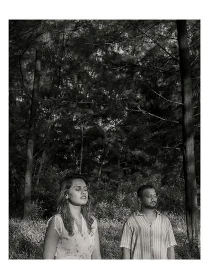 A quiet, meditative moment in the forest. This black and white shot captures a sense of peace and connection with nature.