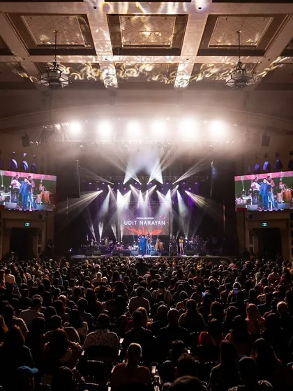 A wide view of the packed auditorium in San Jose. My team and I are equipped to handle events of any size.
