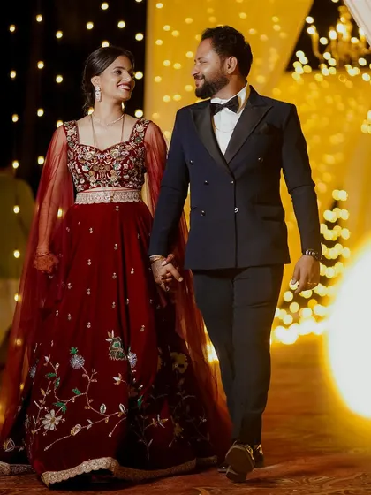 A stolen moment between the happy couple at their reception. My team and I focus on creating an atmosphere where you can relax and be yourselves, allowing us to capture the authentic joy of your celebration.
