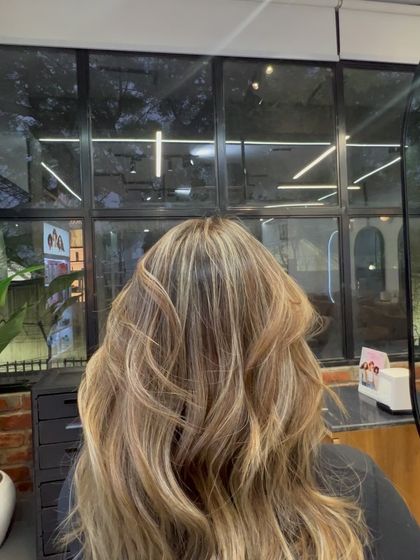 A closer look at the subtle, sun-kissed highlights. This is a great option for clients who want a low-maintenance colour that still makes a statement.
