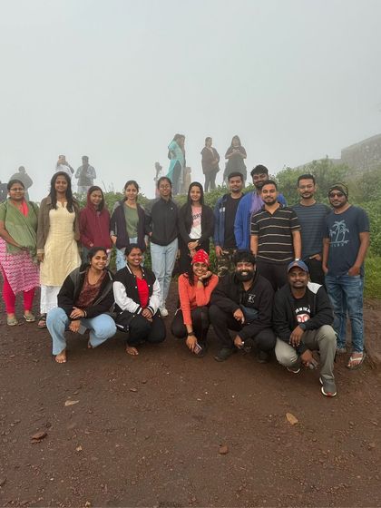 A group photo on a foggy day on the trails.