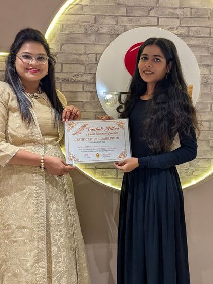 Celebrating another student's successful completion of the intensive mehndi course.