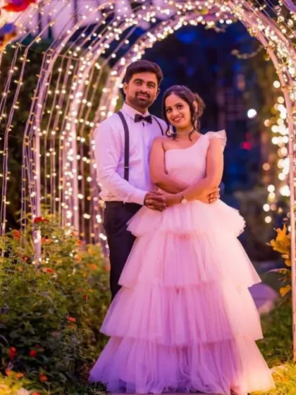 Create a fairytale moment with our beautiful layered gowns. This soft pink tulle gown is perfect for romantic pre-wedding or engagement shoots, especially for evening events with magical lighting.