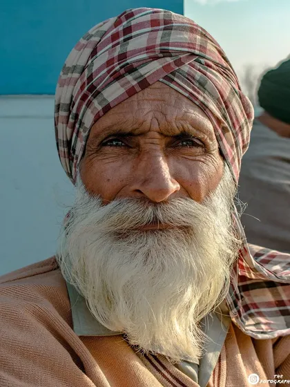 The lines on this gentleman's face tell a thousand stories. I met him in Punjab and was struck by his calm presence. A simple, direct portrait like this can be more powerful than any grand landscape.