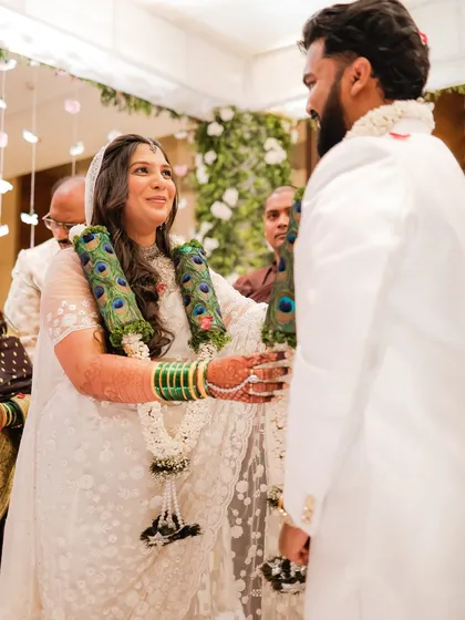 A candid moment from a Buddhist wedding ceremony. The bride's natural makeup look was exactly what she wished for: timeless and elegant.