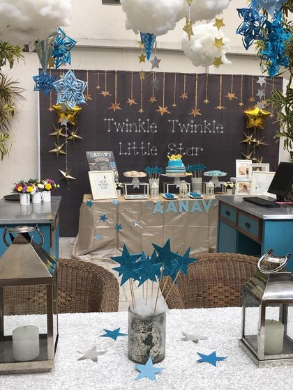 A wider view of the "Twinkle Twinkle Little Star" party, showing how the dessert table and seating area were integrated into one cohesive, starry space.