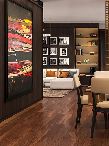 We believe in creating spaces that are as visually stunning as they are comfortable. Here, the warmth of the wooden floors, the rich texture of the wall paneling, and the vibrancy of the abstract art are carefully curated to embrace a feeling of regal, everyday living.