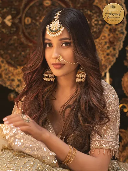A stunning portrait from our Heeramandi-inspired series. The warm, candle-lit background and the model's direct gaze create a powerful and captivating image, ideal for a designer's lookbook.