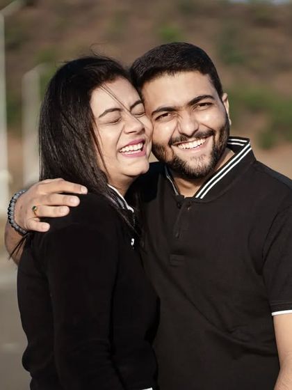 A portrait of pure happiness. Their big, genuine smiles and warm embrace say everything about their love story. This is the kind of joyful, candid moment I love to capture.