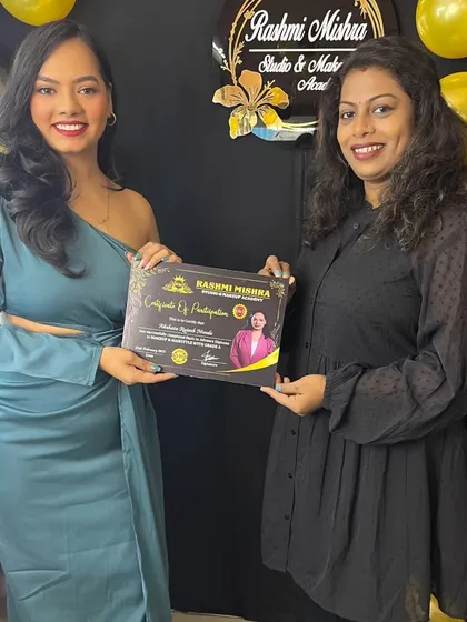 A proud moment with another graduate. She has completed her professional makeup course and is ready for the industry.