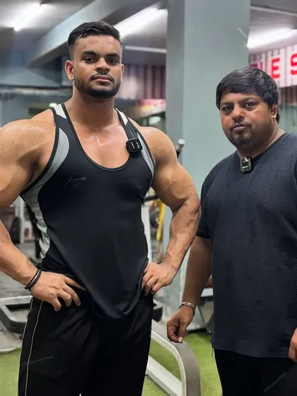 Just training. Focus, dedication, and patience equal results. A photo with two of my dedicated athletes.