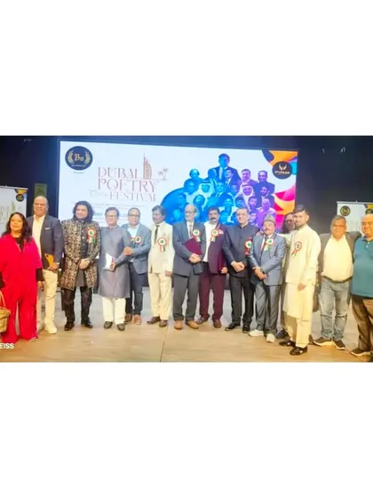 A group photo with fellow artists and organizers at the Dubai Poetry Festival. It was a wonderful gathering of creative minds, and I was honored to be a part of it.