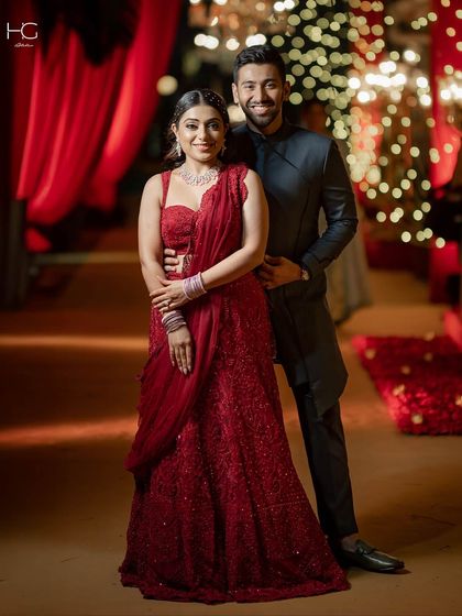 For the man of the hour, a bespoke Achkan crafted to elevate the wedding look. This dark, minimalist piece is all about the cut and fit.