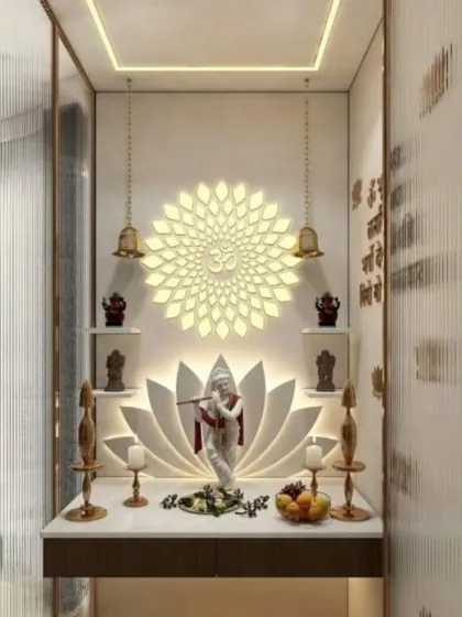 We designed this pooja unit with a multi-layered lighting scheme, featuring a backlit lotus base and a radiant Om mandala on the back wall. This creates a dynamic and sacred space for the Krishna idol.